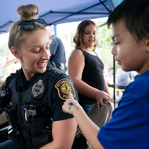 Officer with a kid