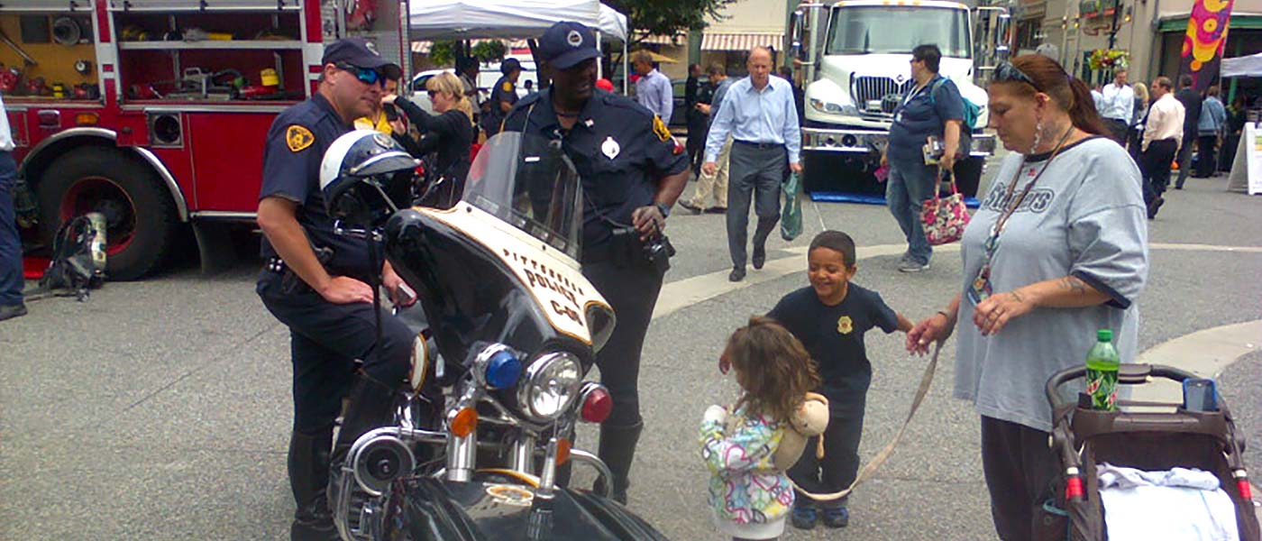 Motorcycle Officer with child.