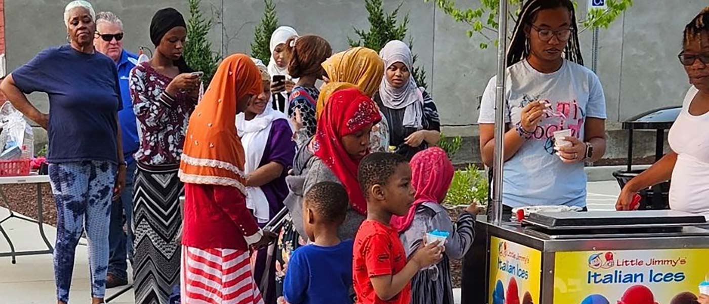 Group of kids and parents in line for Ice Cream